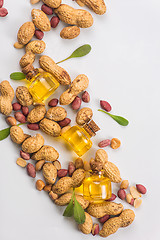 Image showing Natural peanut with oil in a glass