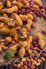 Image showing Natural peanut with oil in a glass