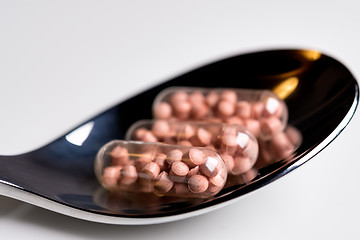 Image showing Tablets on a spoon