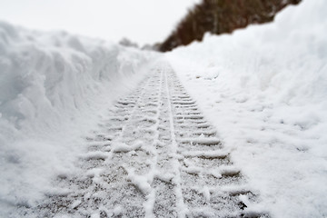 Image showing Image of car tracks in white snow