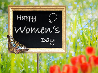 Image showing Black chalkboard with text Happy women\'s day