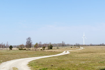 Image showing Beautiful landscape with a winding road to a windmill