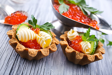 Image showing tartalets, butter and salmon caviar