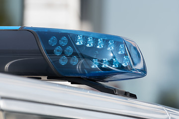 Image showing Detail shot of a blue light on a police car