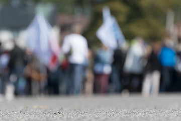 Image showing Blurred image of a crowd on the street