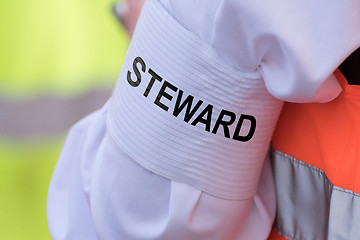 Image showing Detail of an armband with text \