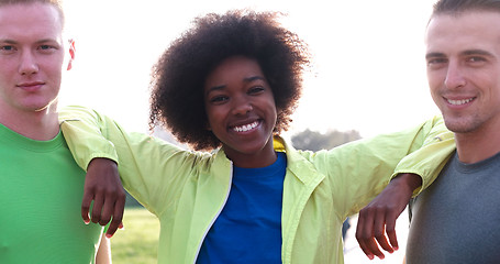 Image showing Portrait of multiethnic group of young people on the jogging