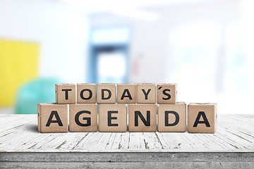 Image showing Today\'s agenda sign on a wooden desk