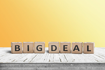 Image showing Big deal sign made of wooden cubes on a desk