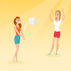 Image showing Two caucasian women playing beach volleyball.