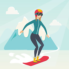 Image showing Young caucasian woman snowboarding.