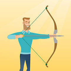 Image showing Young caucasian archer training with a bow.