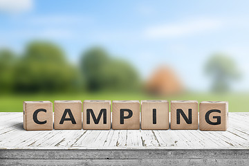 Image showing Camping word on a wooden cube sign