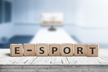 Image showing E-sport sign on a desk in a blue room