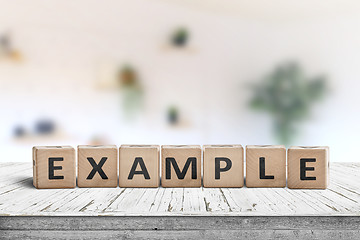 Image showing Example sign on a wooden table in a bright room