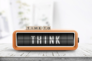 Image showing Time to think text on an old alarm clock