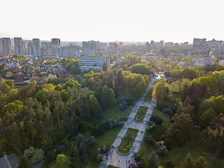 Image showing A bird\'s eye view, panoramic view from the drone to the view of the central alley of the Botanical Garden and the construction of the Pechersk district in the city of Kiev, Ukraine