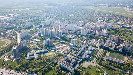 Image showing Aerial view, landscape part of the modern city and private homes spring sunny day Kyiv, Ukraine. Photo from drone