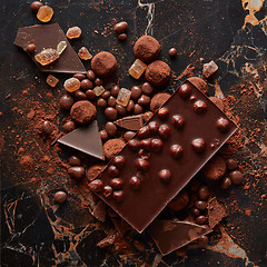 Image showing Top view of luxury delicious chocolate and candies truffles