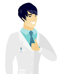 Image showing Young happy asian doctor giving thumb up.