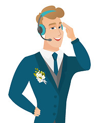 Image showing Young caucasian groom in headset.