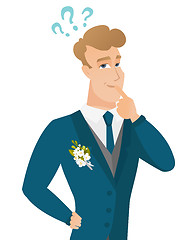 Image showing Young caucasian groom with question marks.
