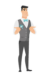 Image showing Caucasian confused groom shrugging shoulders