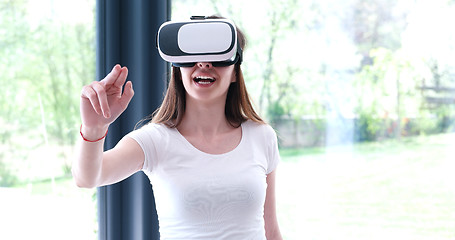 Image showing woman using VR-headset glasses of virtual reality