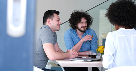 Image showing Multiethnic startup business team on meeting