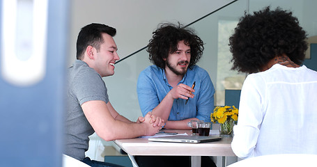 Image showing Multiethnic startup business team on meeting