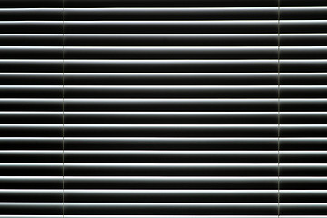 Image showing Plastic closed window blinds in the room.