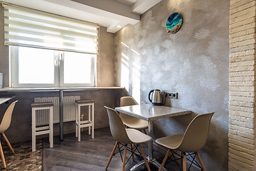 Image showing Fragment of the kitchen interior, with a dining table