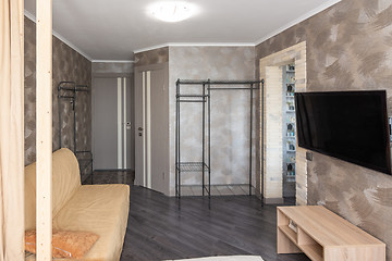 Image showing Interior of a small one-room apartment, view of the door