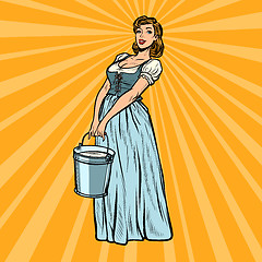 Image showing village woman with a bucket of water