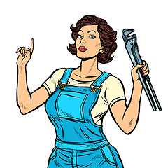 Image showing woman mechanic with a wrench isolate on white background