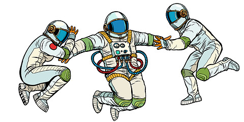 Image showing three astronauts in space in zero gravity isolate on white background
