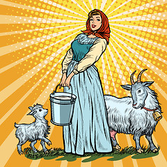 Image showing a village woman with bucket of milk goats