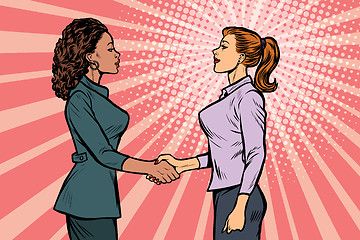 Image showing two businesswomen shaking hands