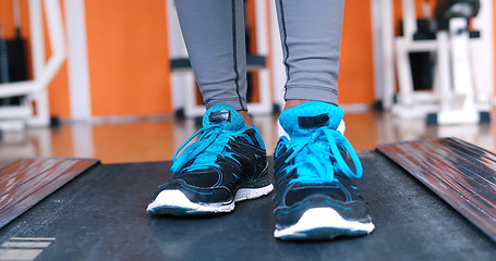 Image showing black female feet in sneakers