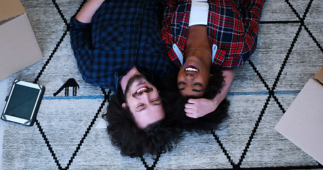 Image showing Top view of attractive young multiethnic couple