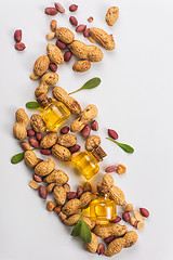 Image showing Natural peanut with oil in a glass