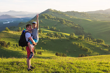 Image showing Happy father and son in the Altai mountains