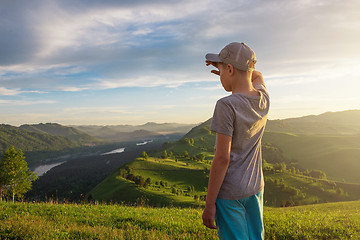 Image showing Young explorer at the sunset