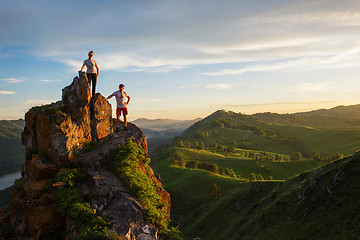 Image showing Happy man and woman on top mountain