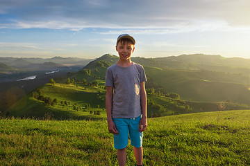 Image showing Young explorer at the sunset