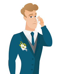 Image showing Young caucasian groom crying.