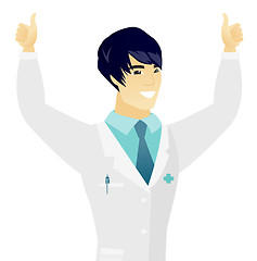 Image showing Young asian doctor standing with raised arms up.