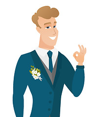 Image showing Young caucasian groom showing ok sign.