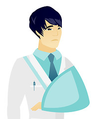 Image showing Young asian doctor with broken arm.