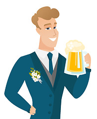 Image showing Young caucasian groom drinking beer.